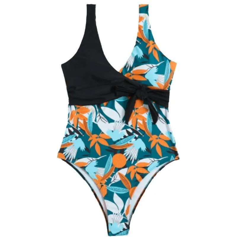Women's high-waist one-piece swimsuit with an all-over printed pattern in a conservative style.