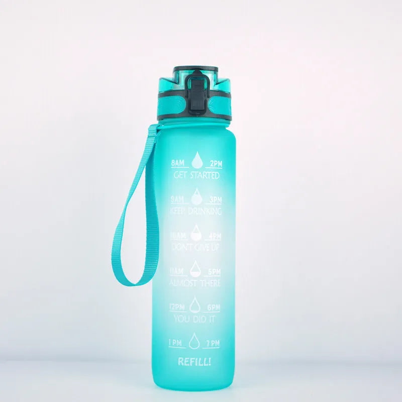 Transparent 1000ml BPA-free Tritan sports bottle with infuser and clear liquid visible