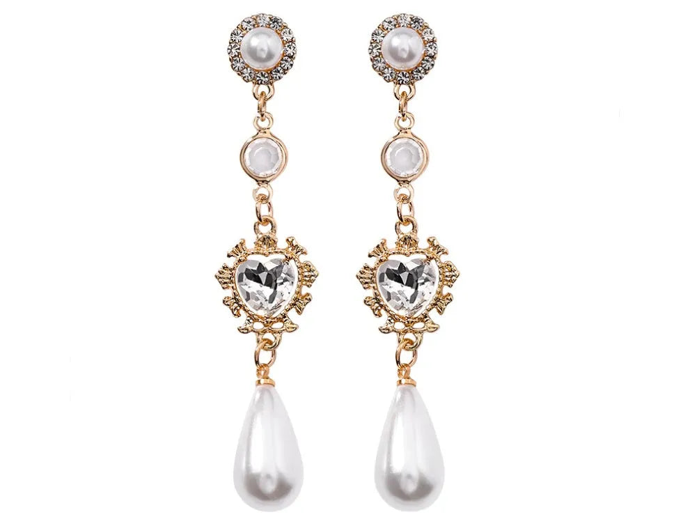 Gold pearl drop earrings with heart-shaped alloy frame and single pearl pendant on gold-tone finish