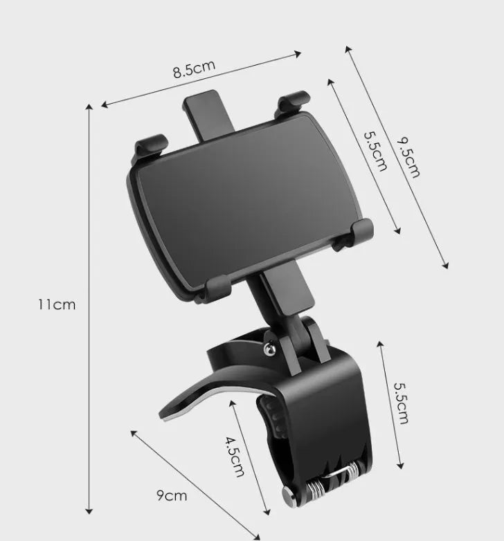 Black car phone holder mounted on dashboard with smartphone in clip