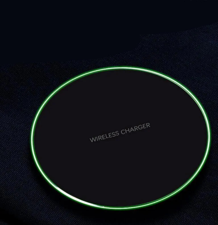 Black 98mm wireless charging pad with copper coil for 9V fast charging iPhone and Samsung