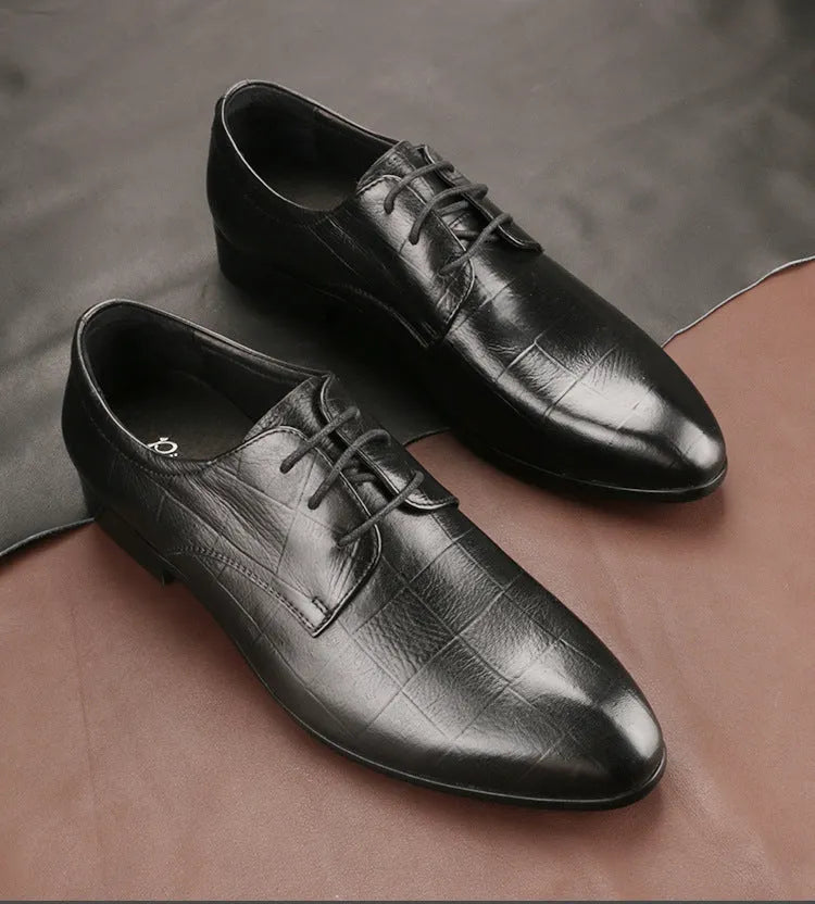 Men's black checkered leather derby shoes with pointed toe and rubber sole