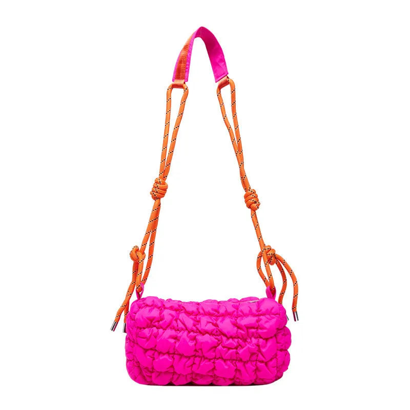 Women's lightweight nylon messenger bag in pillow shape with crossbody strap and rhombus pattern