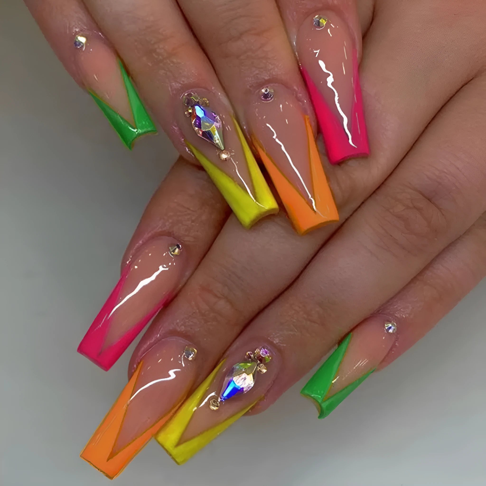 Detachable nail tips with diamond colour French finish and cartoon, love, cross heart patterns, plus jelly glue and filing strip.