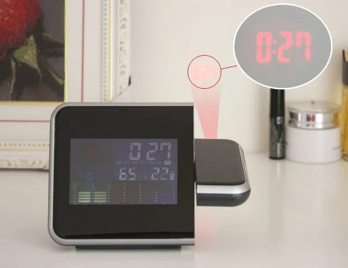 Compact plastic home electronic clock with USB cable in black, dimensions 16 by 6 by 12 centimetres