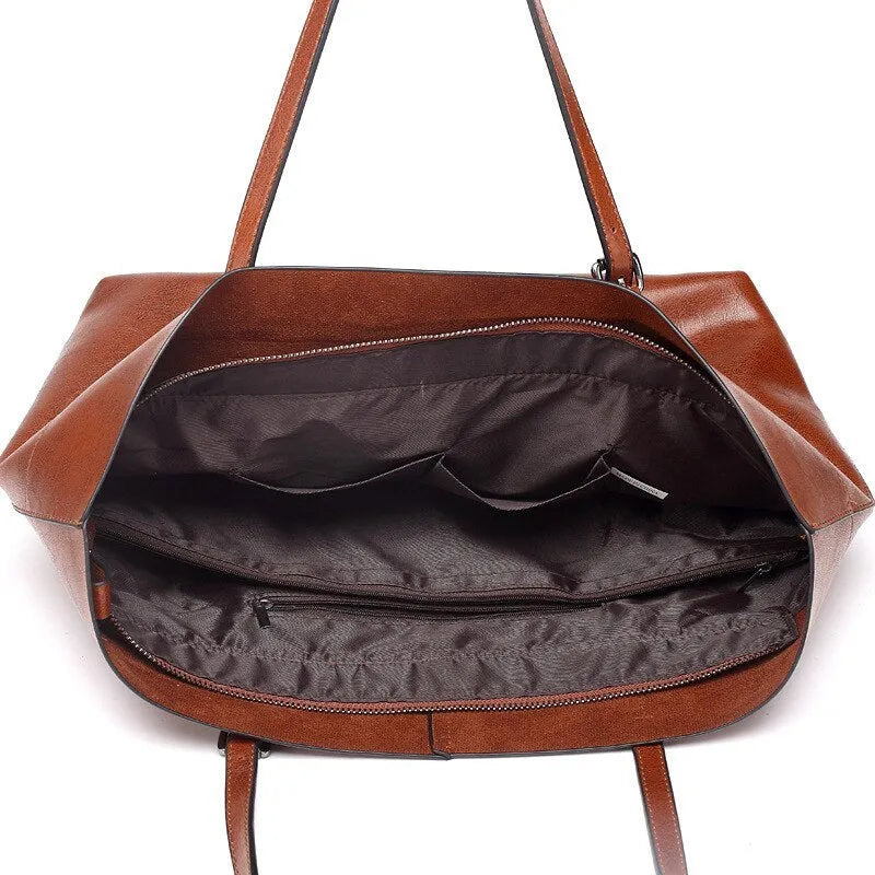 Horizontal waxed cowhide leather crossbody handbag for women showing internal compartments.