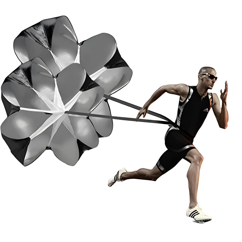 Black 56 inch running speed training parachute with adjustable waist belt on outdoor track