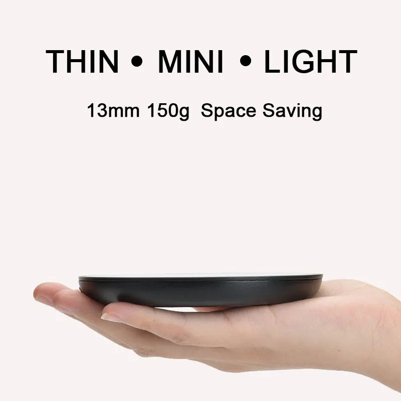 Black adjustable temperature cup warmer with tempered glass surface and low/high switch