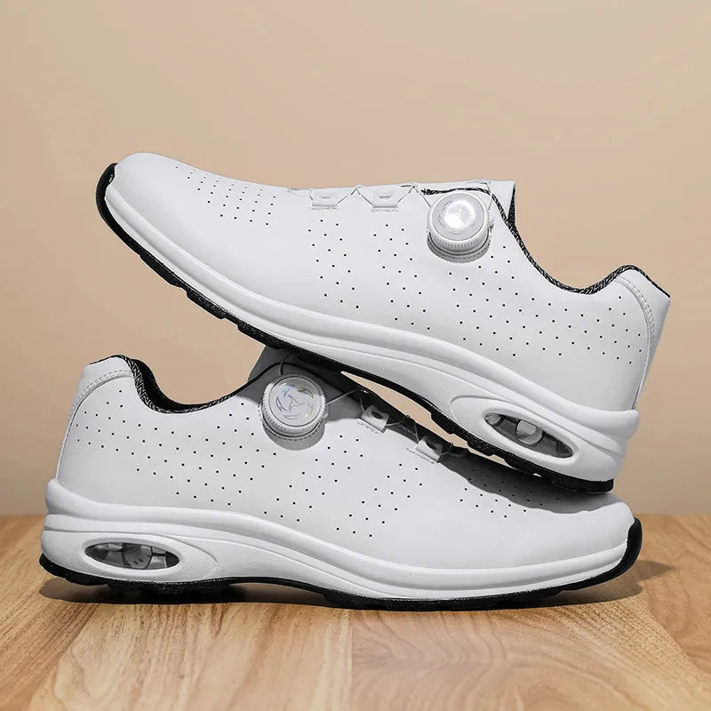 Low top casual shoes with mesh upper, cross shoulder straps and round toe in black or white colours