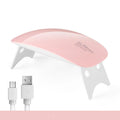 Mini Mouse pink LED phototherapy machine for nail gel curing with 6 lamp beads on a white surface