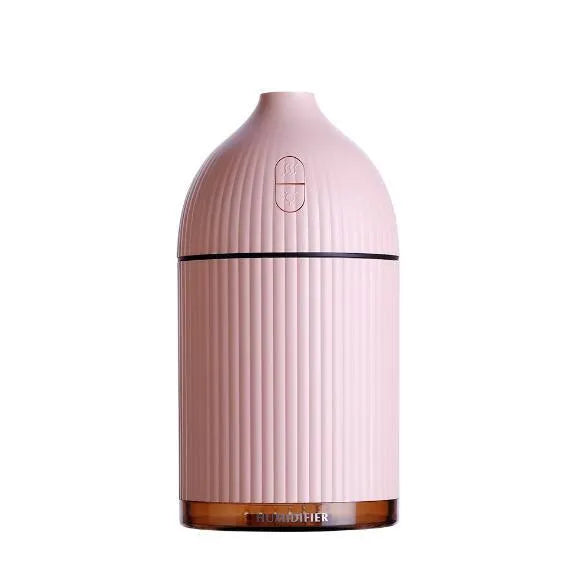 White USB aromatherapy diffuser humidifier with 300ml capacity and LED light on wooden table