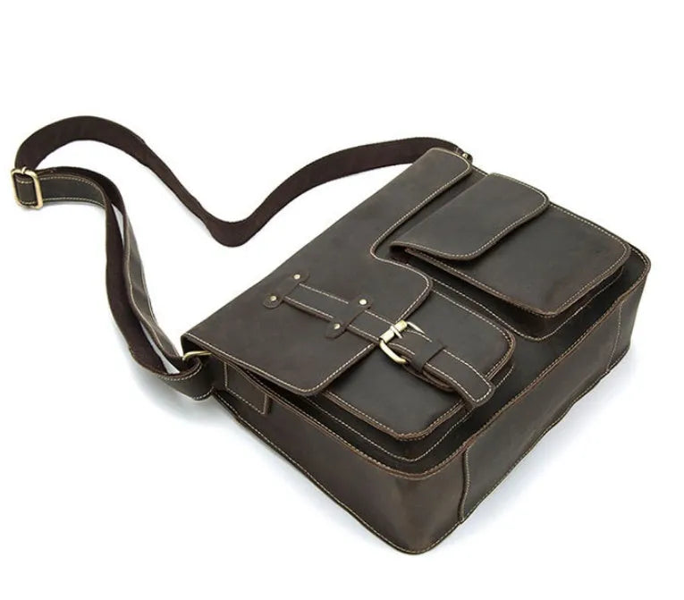 Vintage leather messenger bag with crossbody strap showing multiple compartments and available in three colour options