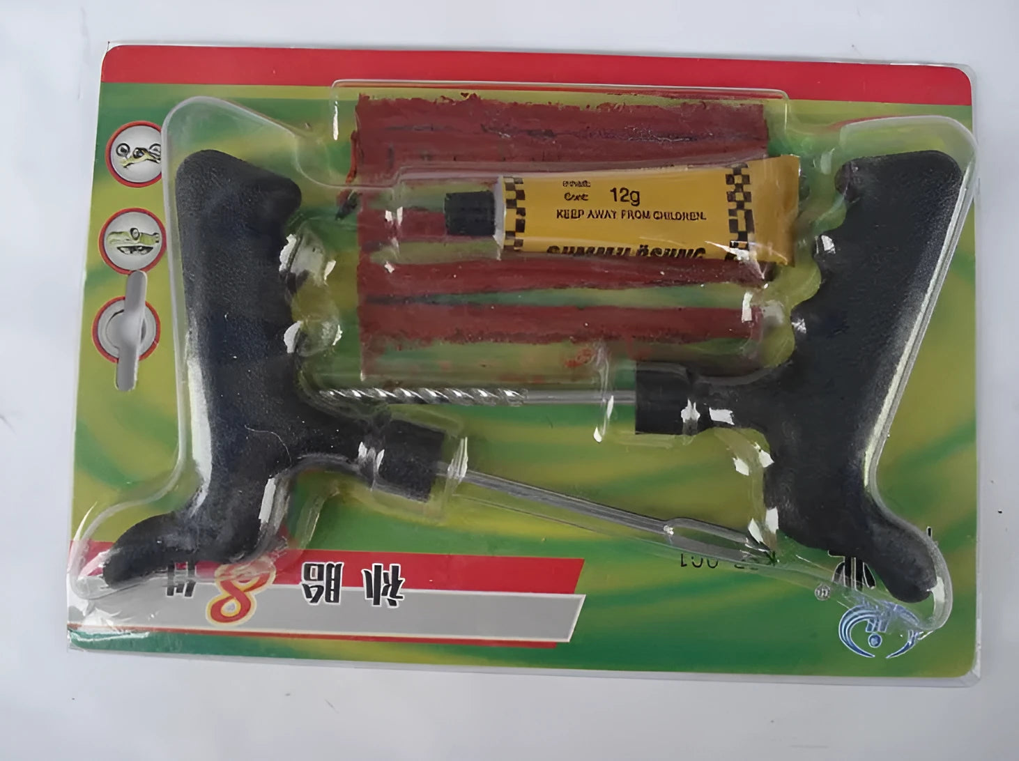 Black and yellow vacuum tire repair tool set with probe, glue, and rubber strips on a white background.