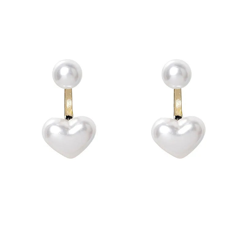 A pair of Korean-style heart-shaped stud earrings with inlaid artificial gems on an alloy base.