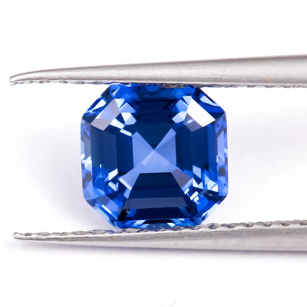 Royal blue heart-shaped tiara design cultivated gemstone on a white background