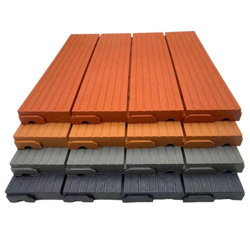 Wood grain plastic floor tiles showing splicing design and non-slip surface texture