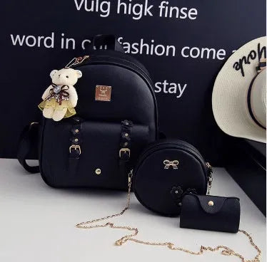 Women's 3-piece floral leather bag set showing backpack, shoulder bag, and card purse
