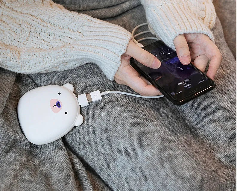 Cute cartoon penguin and polar bear design USB rechargeable electric hand warmer.