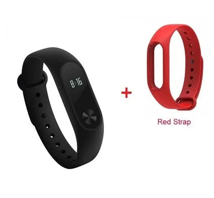 Black Xiaomi Mi Band 2 fitness tracker on wrist showing OLED display with heart rate reading