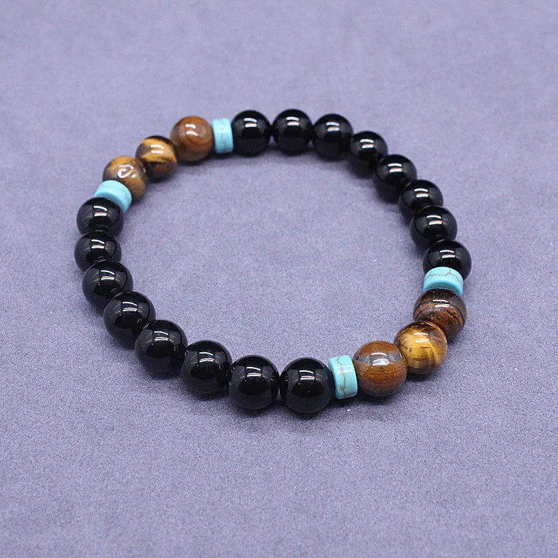 Natural agate jewellery set showing black agate bracelet and Tiger stone necklace with geometric design