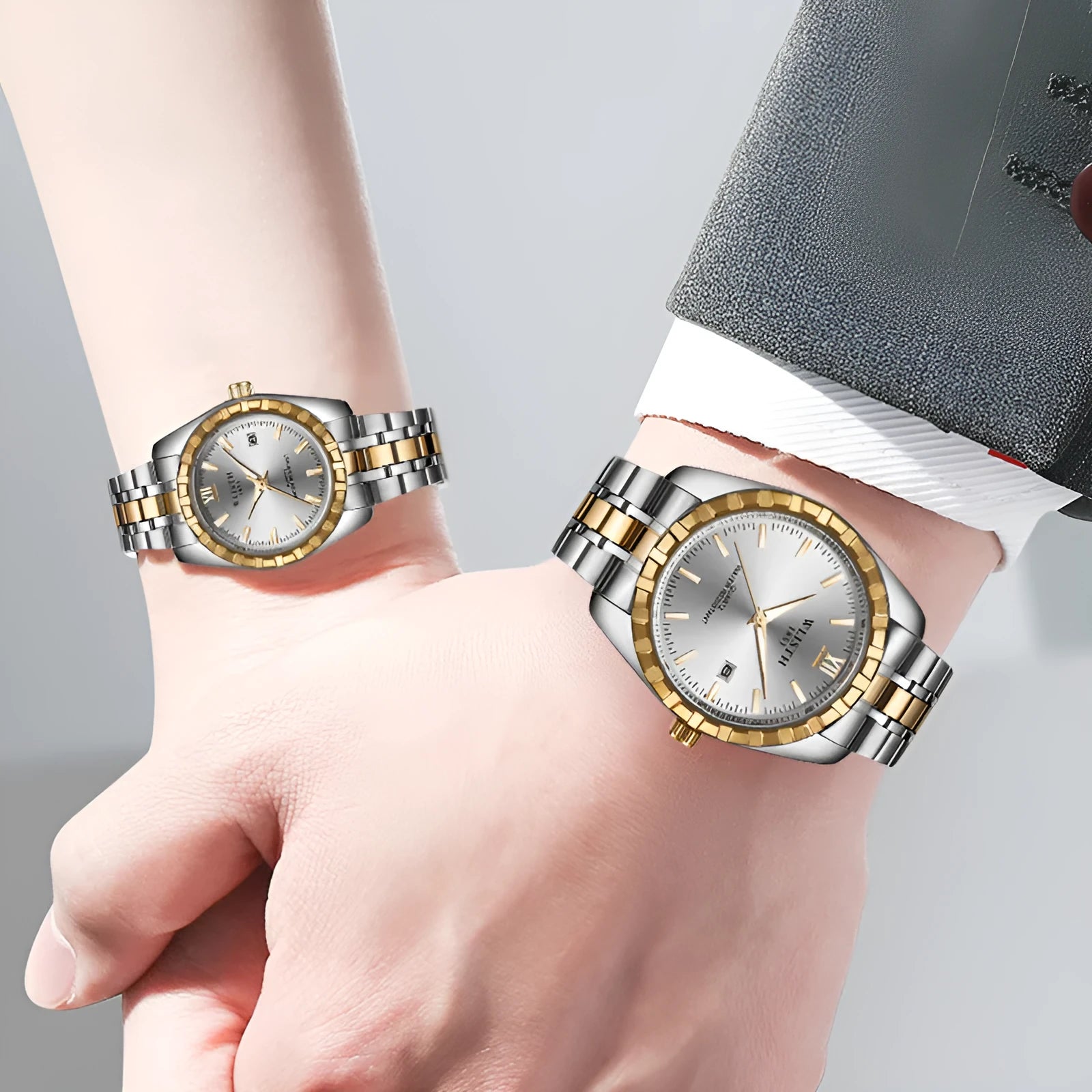 Couple watch with steel band, 28mm dial, luminous hands, calendar, and 30-metre water resistance in silver finish.