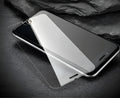 Tempered glass screen protector with 9H hardness for iPhone and Samsung phones.