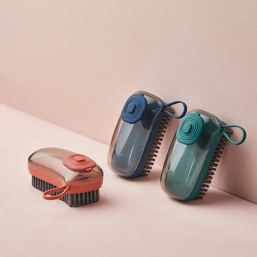 Automatic liquid cleaning brush for shoes and laundry with ergonomic grip in blue, green or red colour