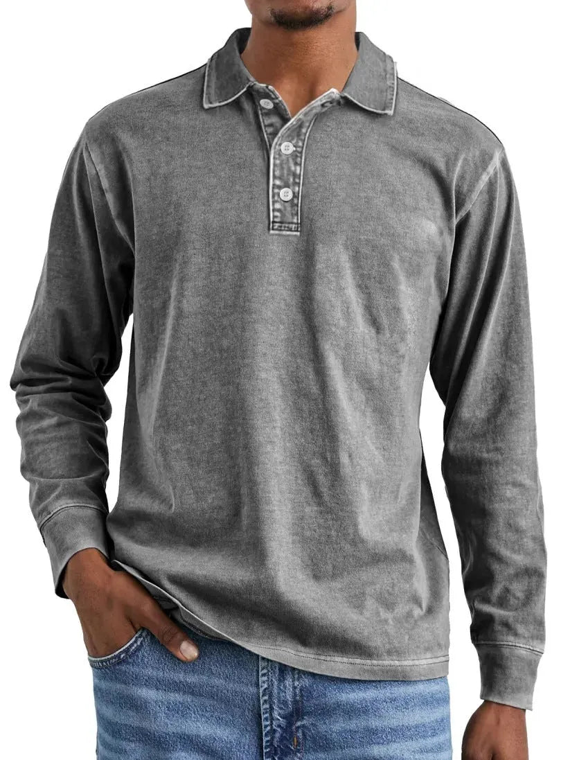 Man's retro washed cotton long sleeve polo shirt with button-up front and lapel collar in various colours.