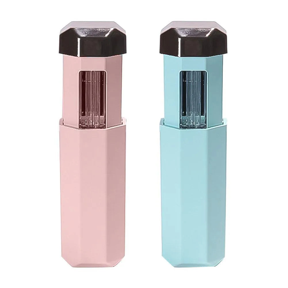 Portable UVC ozone USB germicidal wand in blue with foldable design on a table