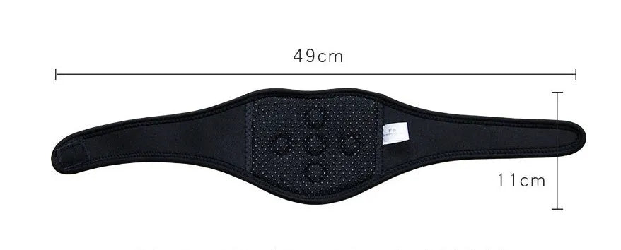Black self-heating magnetic neck guard with adjustable shoulder strap on a grey background.