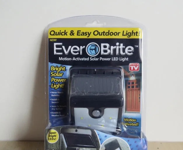 Solar-powered 4 LED outdoor sensor light with motion detection for gardens and pathways