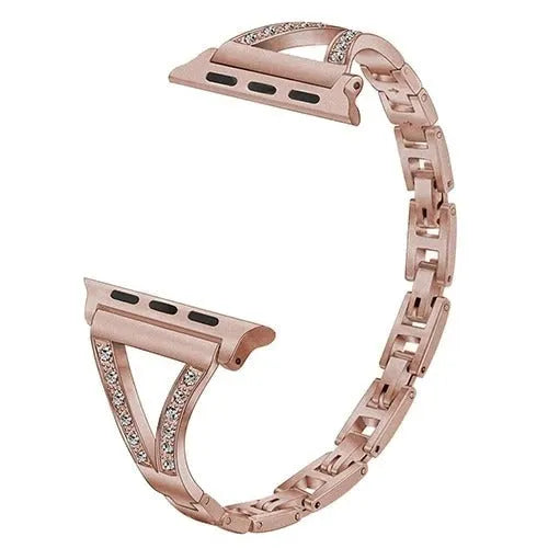 Stainless steel Apple Watch strap with diamond studs in rose gold, shown attached to a watch.