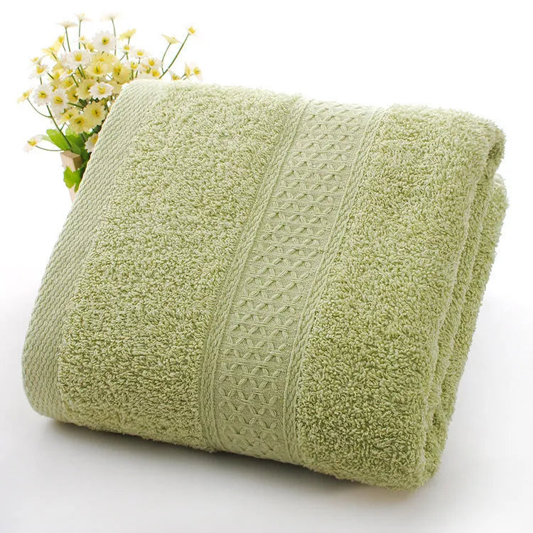Thickened 800 gsm cotton bath and beach towel shown in apple green colour