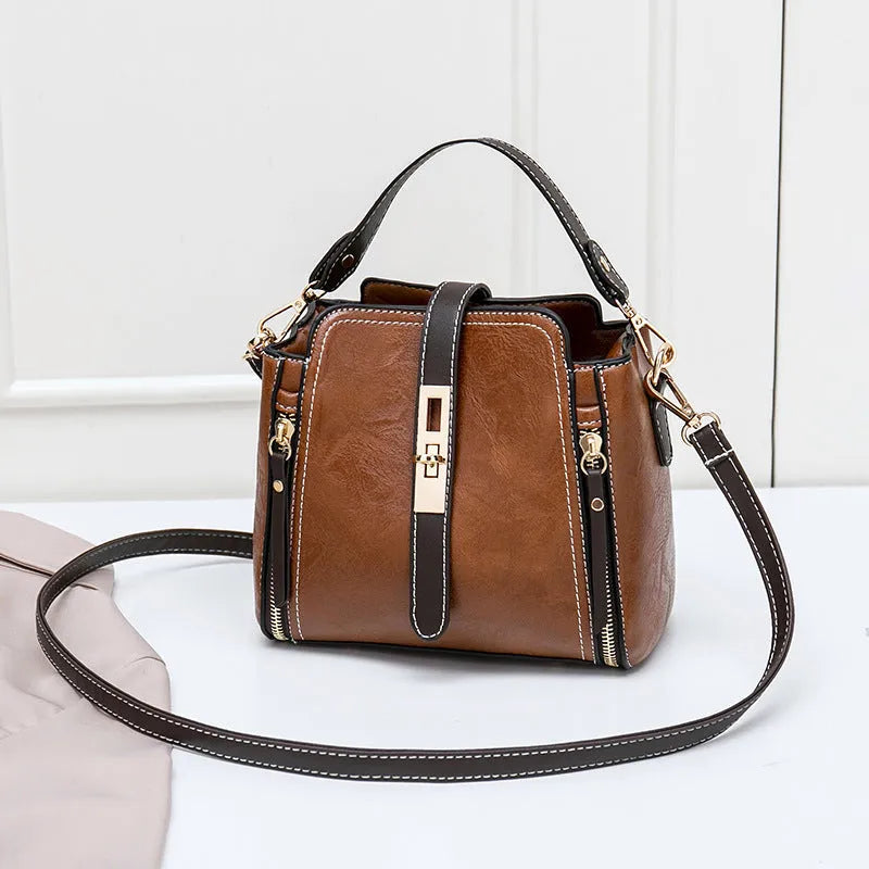 Women small faux leather shoulder bag with detachable strap and turn-lock closure, black colour