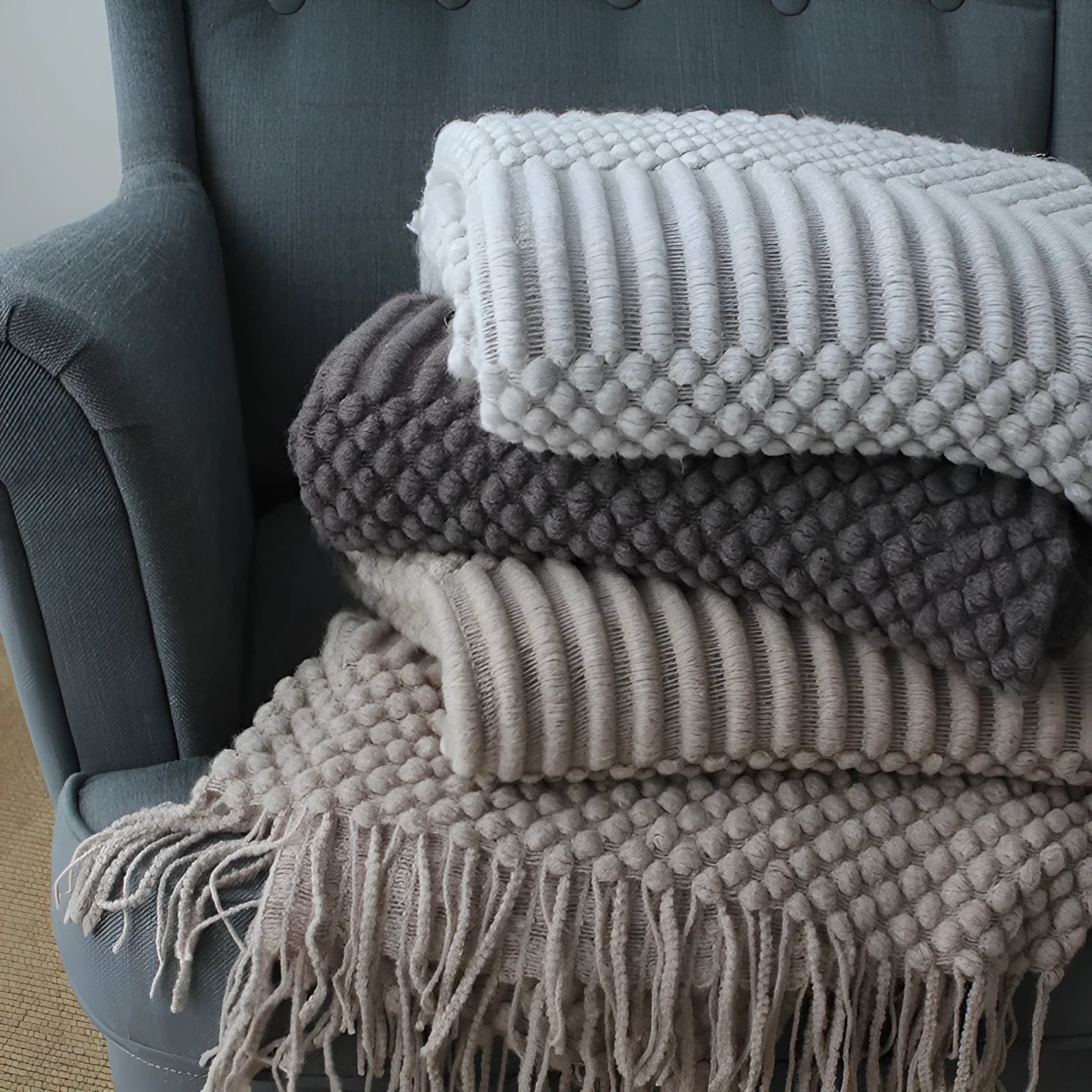 127cm by 170cm polyester fibre nap blanket in dark grey, khaki, and light grey colour options