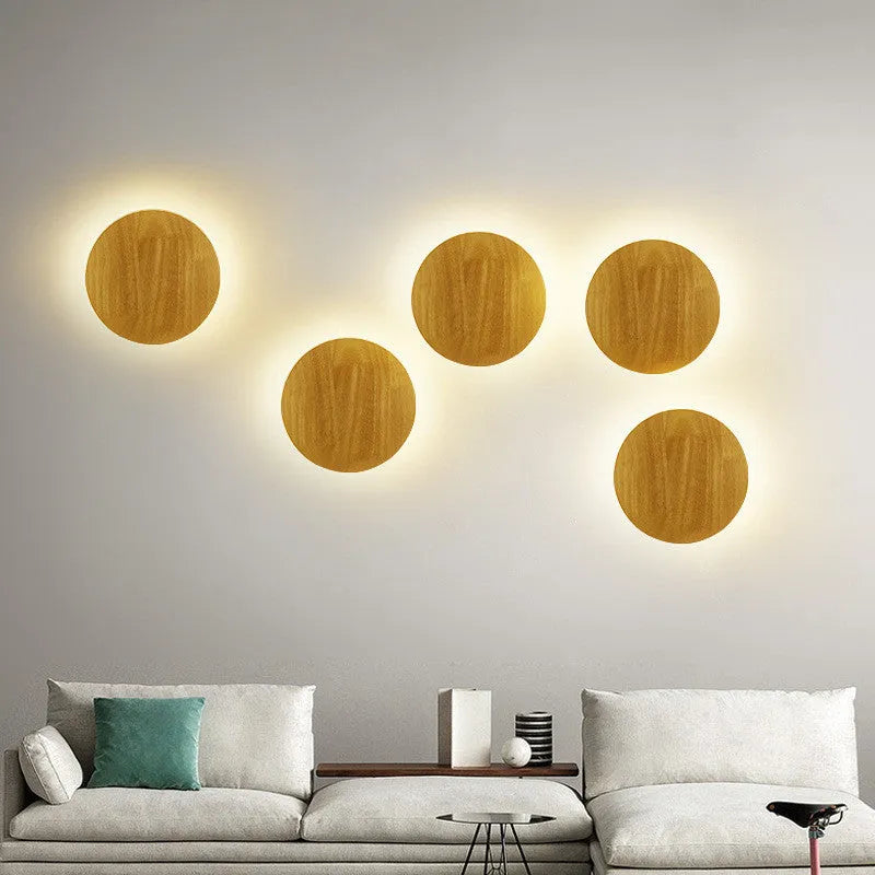 Log Art wood LED wall lamp with oval shape and warm light on a white wall