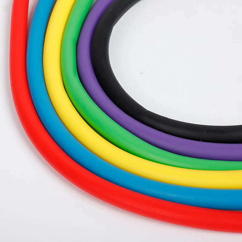 Set of five colour-coded latex resistance band pull ropes in black, blue, green, red, and yellow on a white background.