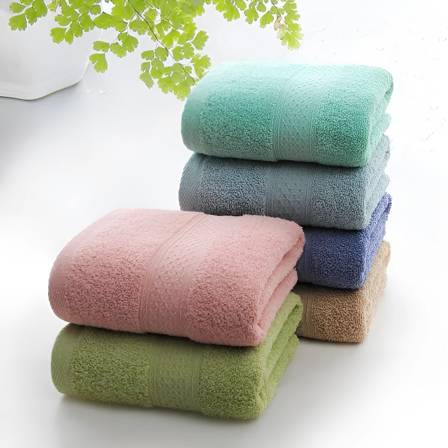 Thickened 800 gsm cotton bath and beach towel shown in apple green colour