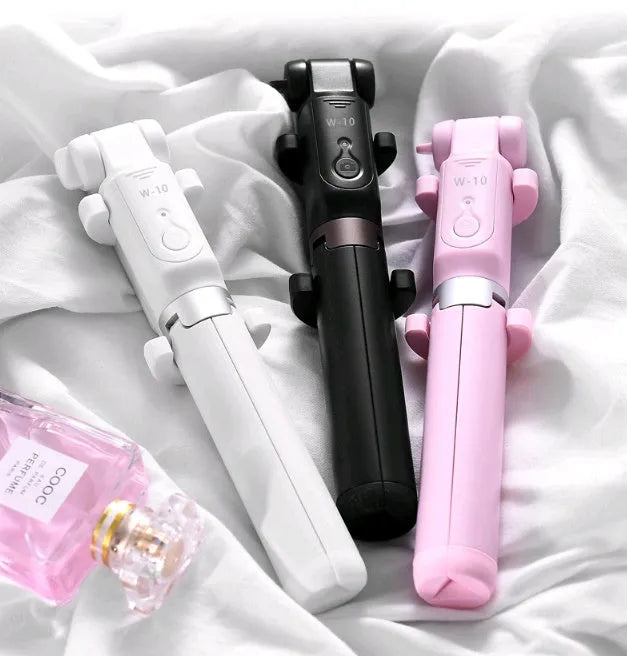 Aluminium alloy Bluetooth selfie stick with remote control and adjustable phone clip in black, pink, or white.