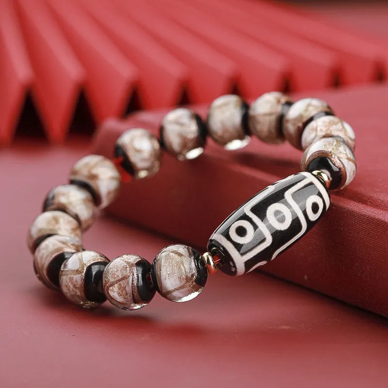 Handcrafted Chinese coloured glaze bracelet with snake year beads in auspicious patterns