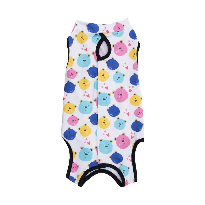 Cat wearing a patterned post-surgery recovery suit with Velcro fastenings on the back.