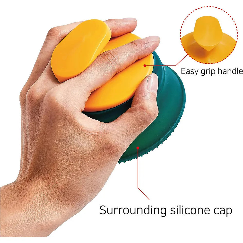 Green double-sided knotted silicone pet hair remover brush on a clean surface