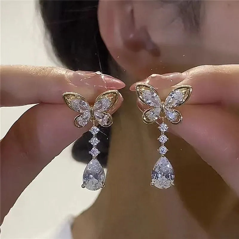 Silver-tone bow stud earrings with electroplated finish on zinc alloy