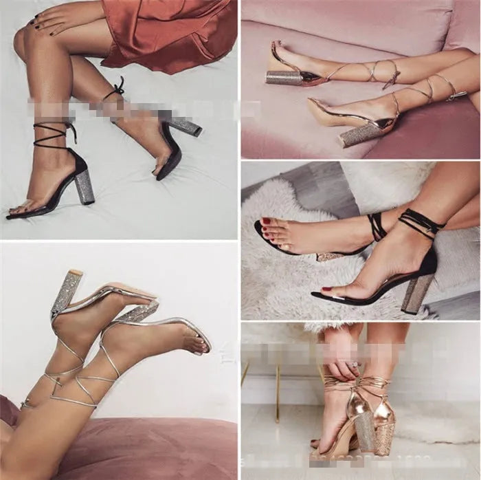 A pair of women's black plastic high heel sandals with a pointed toe on a plain background.