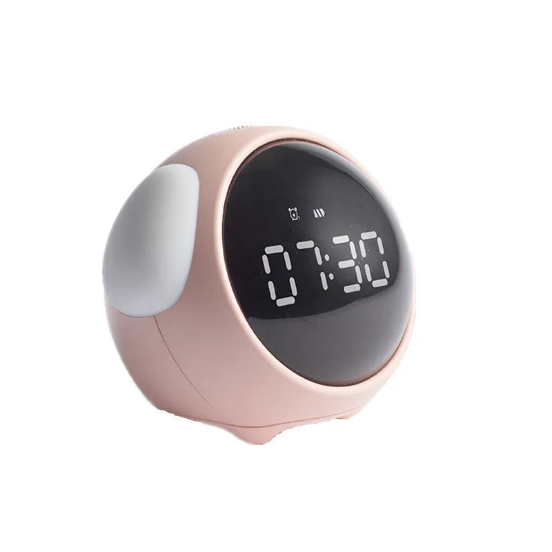 Multi-function alarm clock with pixel expression display and warm night light on a bedside table