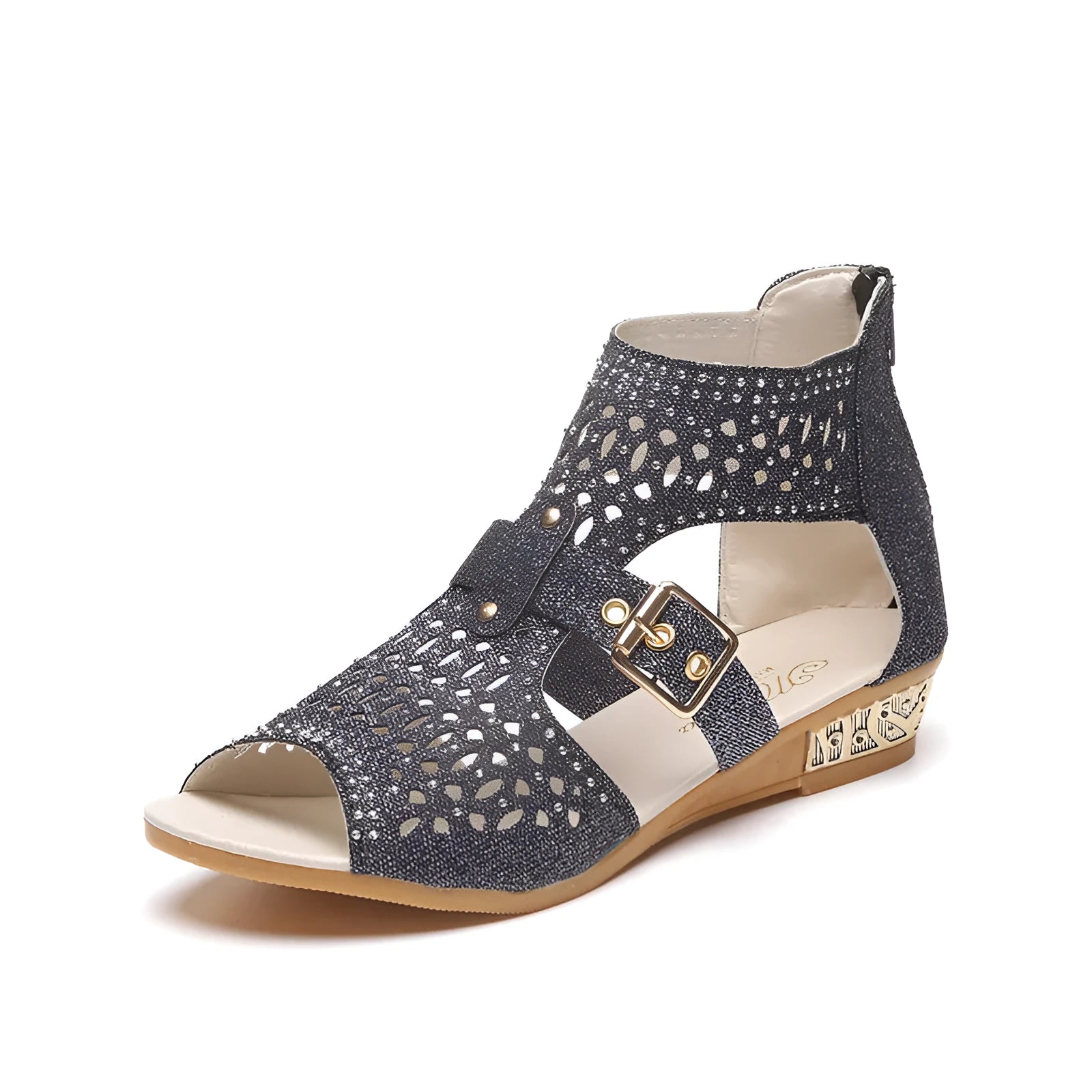 Women's beige rivet sandals with a back zipper and a low wedge heel.