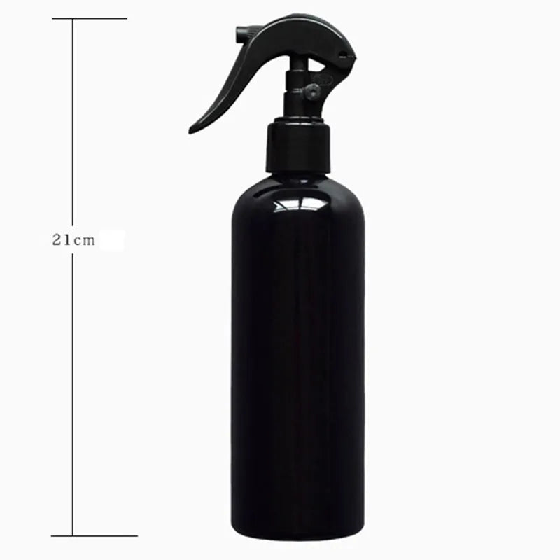 Black plastic and metal miniature garden tool set for succulents with cushion and watering bottle