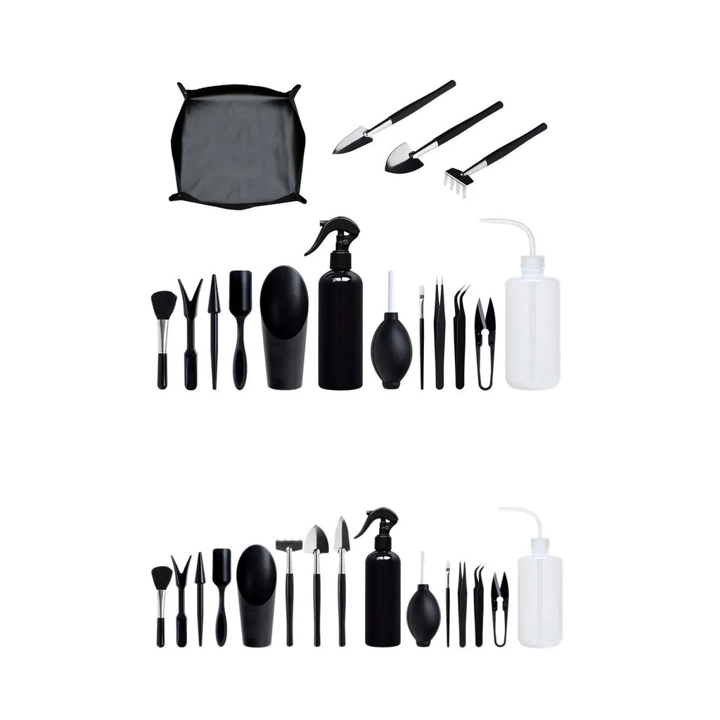 Black plastic and metal miniature garden tool set for succulents with cushion and watering bottle
