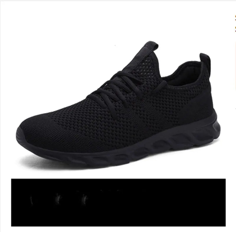 Men's black and white mesh sport shoes with lace-up front and round toe design