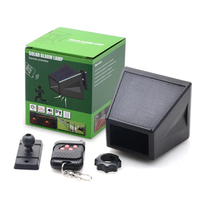 Black solar infrared body sensing alarm lamp with LED light, IP65 rated, 90x90x85mm, mounted on a wall